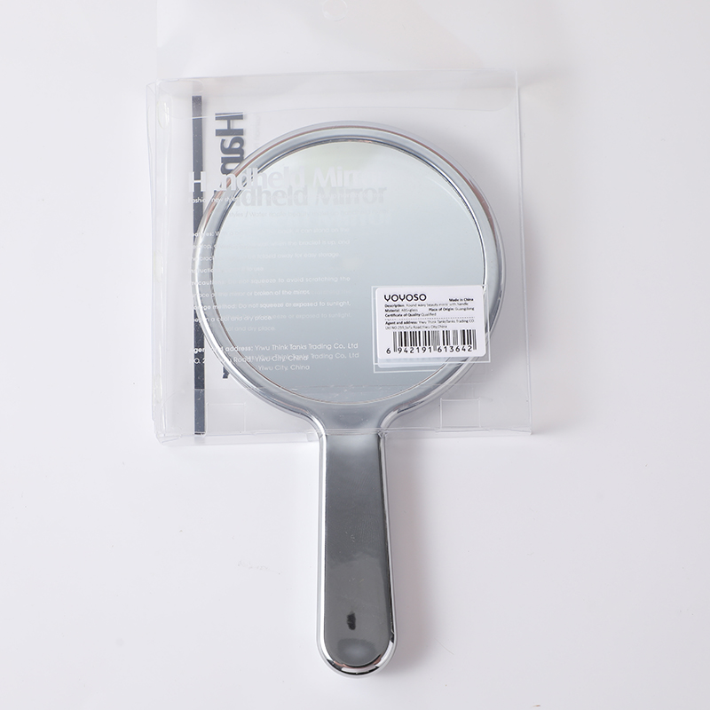 Round wavy beauty mirror with handle