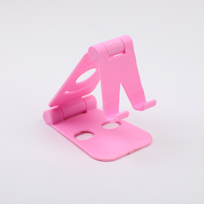 Foldable desktop phone holder
